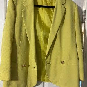 Vintage Gianni Versace lime green blazer with matching skirt.